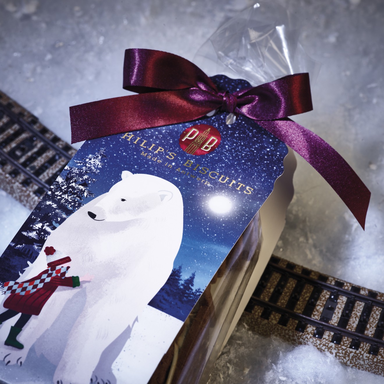 Quatre Mains package design - ballotin, cold foil, polar bear, Polar express, holiday season, magic